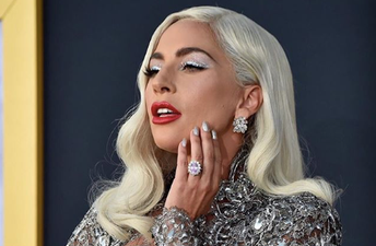 ‘Everything’s fine’ – Lady Gaga went flying after a fan pulled her off the stage last night