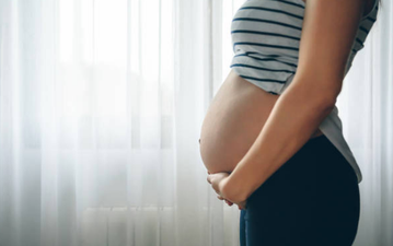 Same-sex couple become first in world to carry baby in both of their wombs