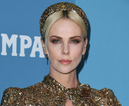 Charlize Theron looked like a golden goddess at last night’s Costume Designers Guild Awards