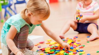 Childcare fees are set to be capped under new government budget