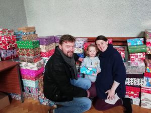 Couple who met volunteering with Team Hope make donating shoeboxes their family tradition