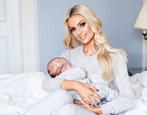 Rosanna Davison brings her twin boys home to meet their big sister