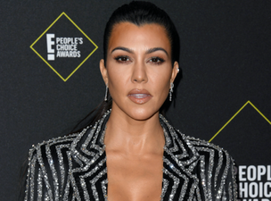 Kourtney Kardashian and Travis Barker are officially dating