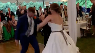 Bride dislocates her leg during her first dance in viral clip