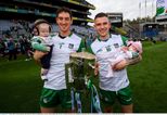 Limerick hurlers pose with their babies after historic win