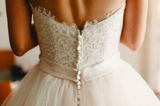 Bride disinvites woman from wedding, still wants to wear her dress