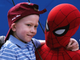 Boy who saved little sister from dog attack invited to Spider-Man set