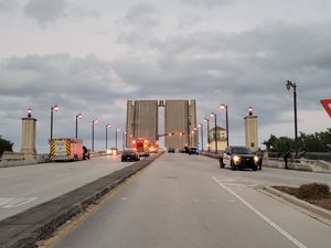 Woman dies after falling through a drawbridge that lifted unexpectedly