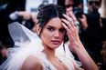 WATCH: People are losing it over clip of Kendall Jenner trying to climb stairs at Kourtney’s wedding