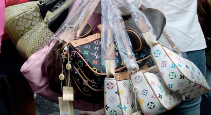 Buying fake designer goods abroad this summer can have some serious consequences