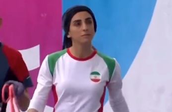 Iranian climber who competed without hijab appears on state TV following concerns she had gone missing