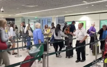Peppy Dublin Airport worker goes viral for keeping security queue entertained
