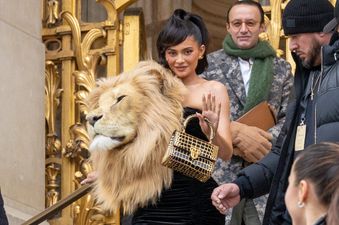 Kylie Jenner wears huge lion’s head attached to dress at fashion show