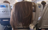 Woman left stunned after plane passenger drapes hair over back of her seat