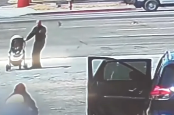 Hero saves baby after pram nearly rolls into oncoming traffic