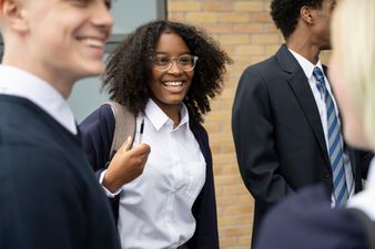 Gender neutral uniforms introduced in school as it welcomes girls for the first time in 135 years
