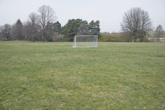 Goal post in the middle of a field