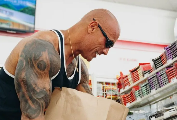 Dwayne Johnson returns to shop he used to steal from as a kid to ‘right the wrong’