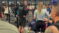 Hyrox athlete completes race while girlfriend is treated by paramedics